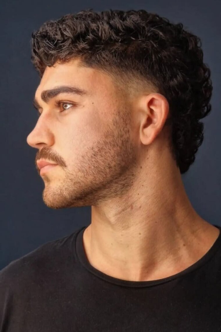 Mullet ricci uomo: la variante che valorizza il riccio naturale